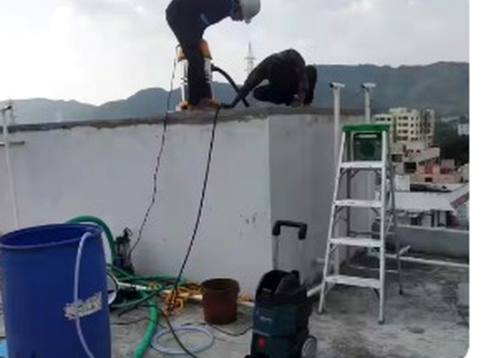 Roof waterproofing work in progress